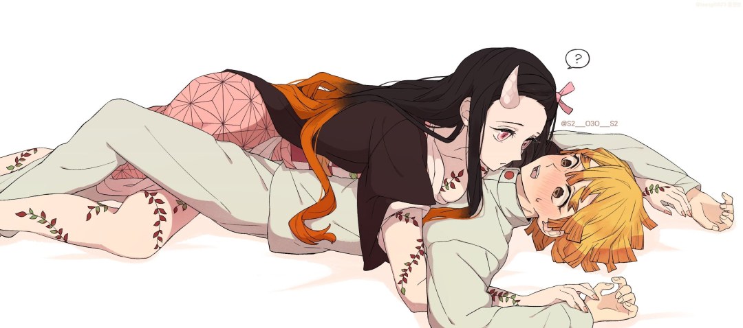 Nazuko y Tanjiro beso