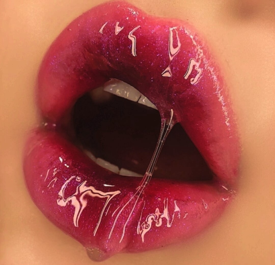 Labios rosados de la estética