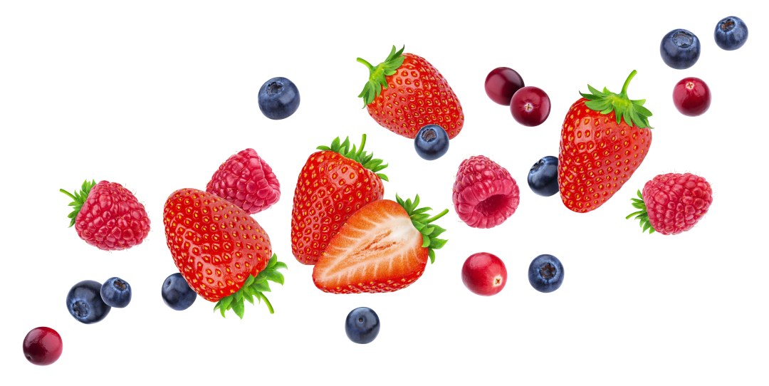 Frutas dispersas sobre un fondo blanco