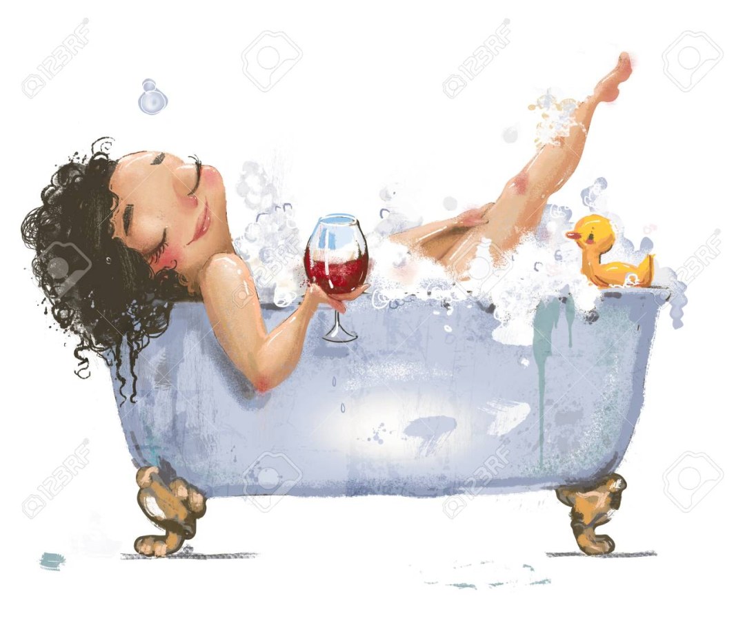 Chica en el baño con un vaso