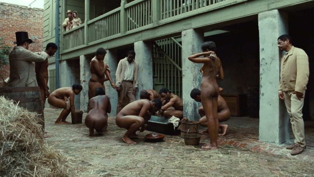 Esclavos negros desnudos en la película