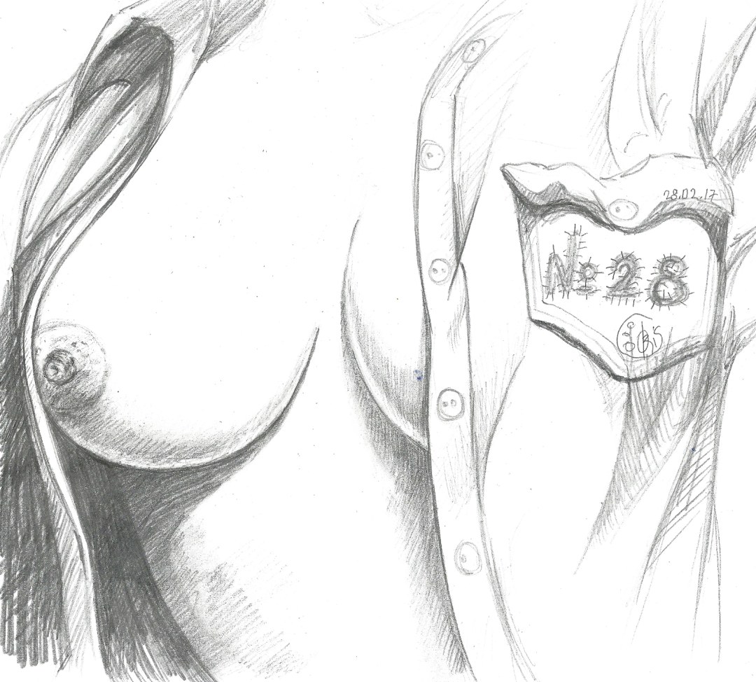 Tetas dibujando con un lápiz